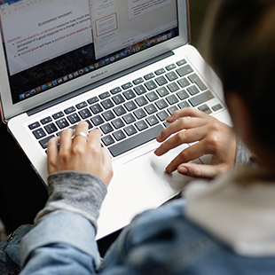 Image for student typing on laptop